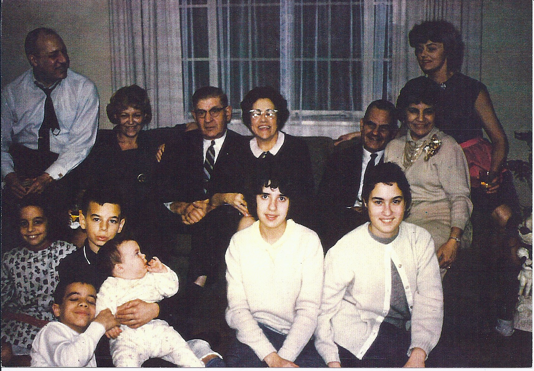 One brother holds me firmly, while the elder basks in my presence. (bottom left) Look how I magnetize all of my mother's attention! (upper right)